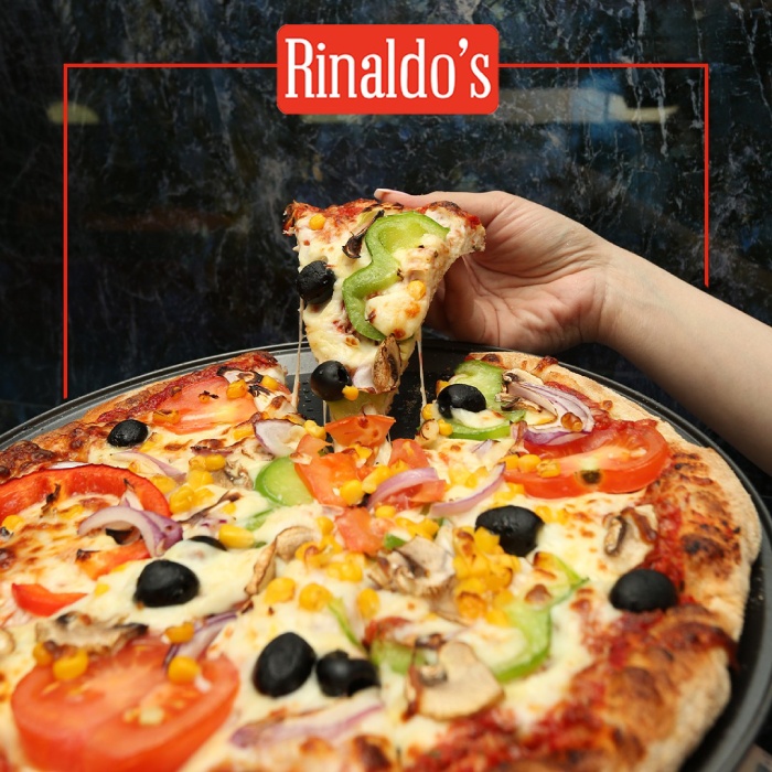  slice of Rinaldo's fully loaded pizza in Glasgow. 